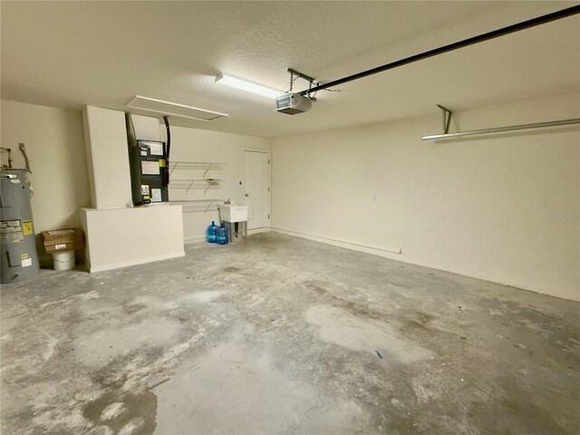 505 Pentas Ln, Haines City, FL 33844 - garage with electric water heater, a garage door opener, a sink, and heating unit