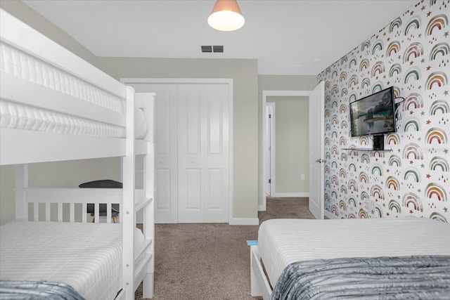 bedroom featuring carpet floors and a closet