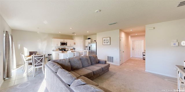 living room featuring light tile patterned floors