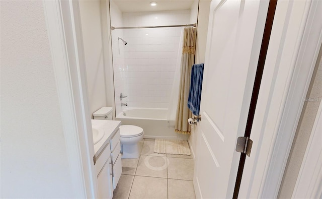 full bathroom featuring toilet, shower / bath combo with shower curtain, tile patterned floors, and vanity