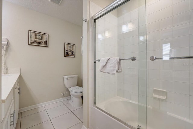 full bathroom with a textured ceiling, tile patterned flooring, vanity, bath / shower combo with glass door, and toilet