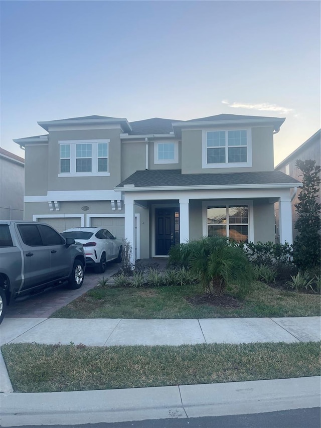 view of front of house with a garage