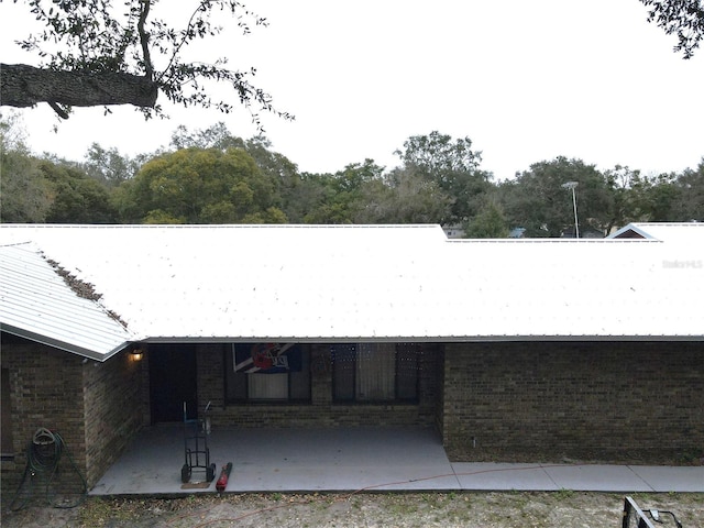 exterior space with a patio