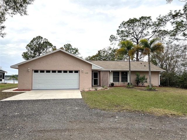 ranch-style house with a front lawn and a garage