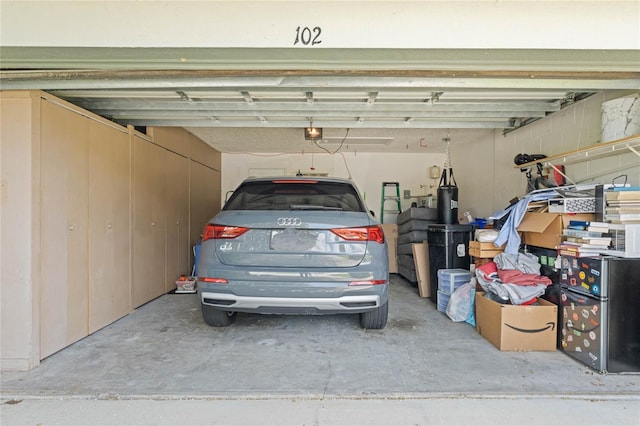 garage featuring a garage door opener