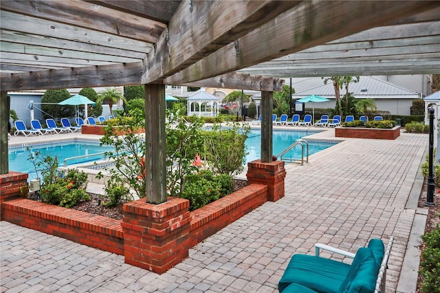 view of swimming pool featuring a gazebo, a pergola, and a patio area