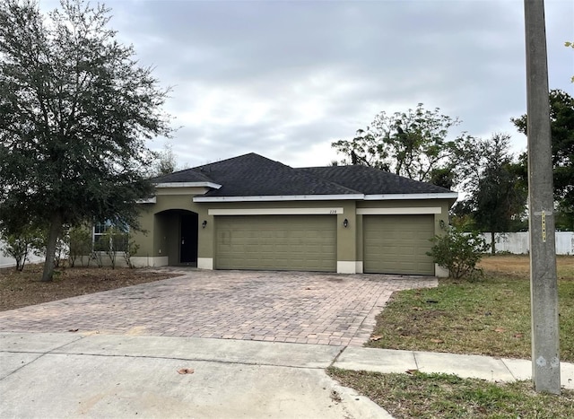 view of front of property featuring a garage