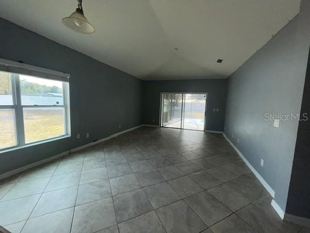 spare room with tile patterned floors