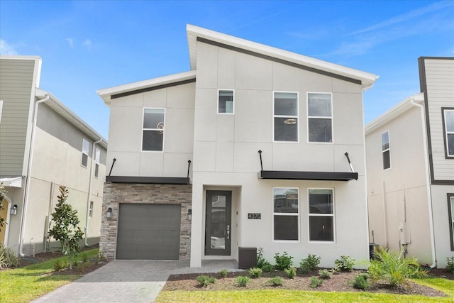 view of front of property with a garage