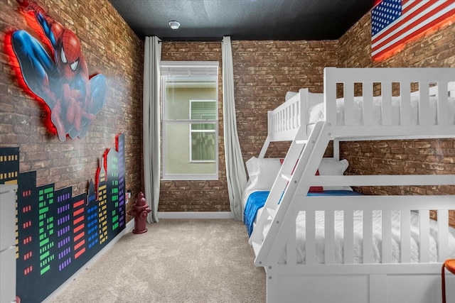 unfurnished bedroom featuring brick wall and carpet