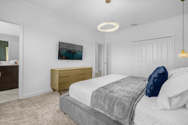 bedroom featuring light carpet, a closet, and ornamental molding