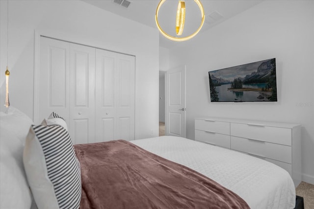 bedroom featuring a closet and carpet flooring