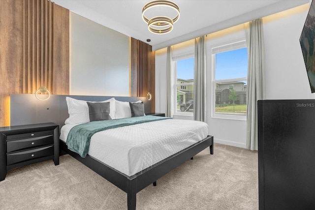 bedroom with light colored carpet