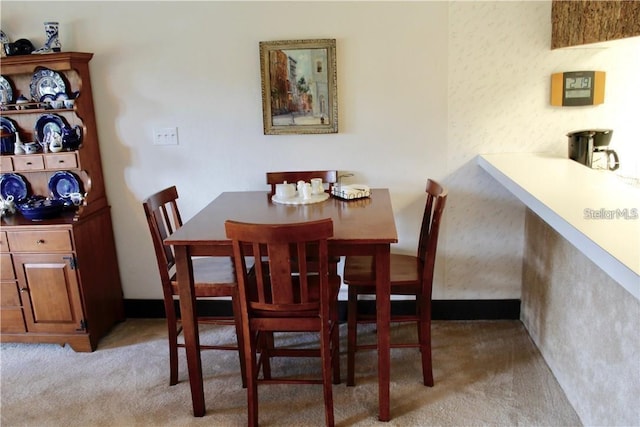 view of carpeted dining room