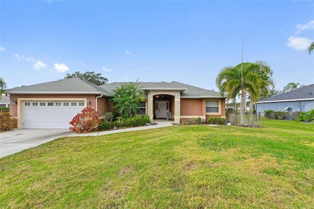 view of front of home featuring a front yard and a garage