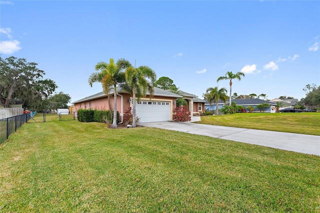 single story home featuring a front lawn and a garage