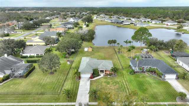 drone / aerial view with a water view