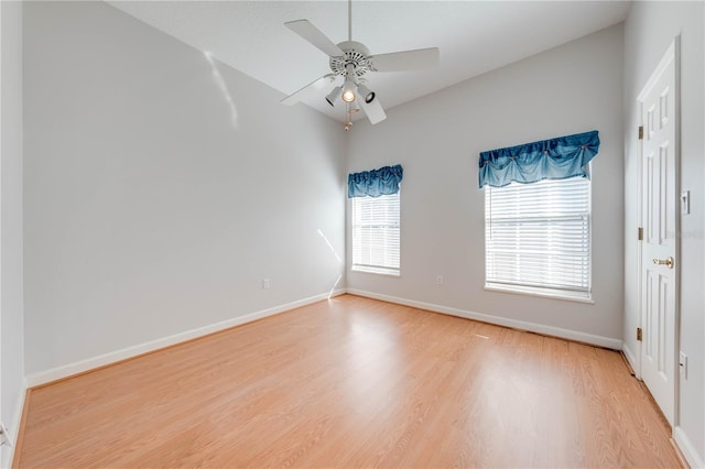 unfurnished room featuring ceiling fan and wood-type flooring