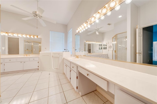 bathroom featuring a shower with shower door, tile patterned flooring, and ceiling fan