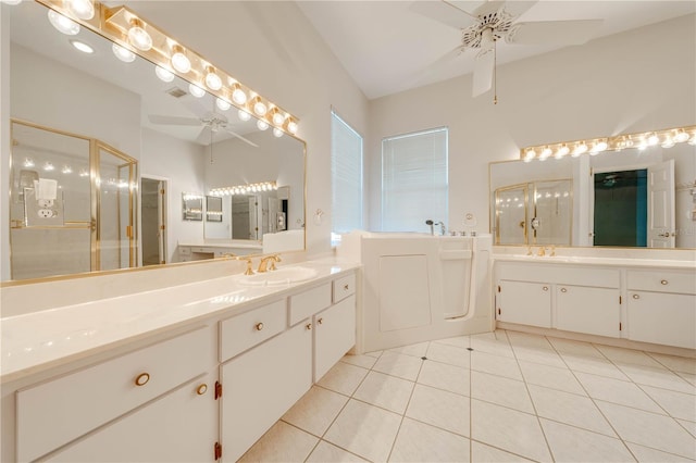 bathroom featuring vanity, ceiling fan, tile patterned floors, and a shower with door