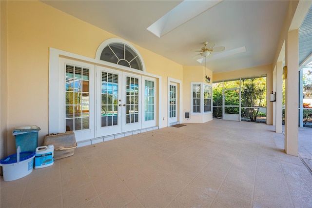 exterior space with ceiling fan and french doors