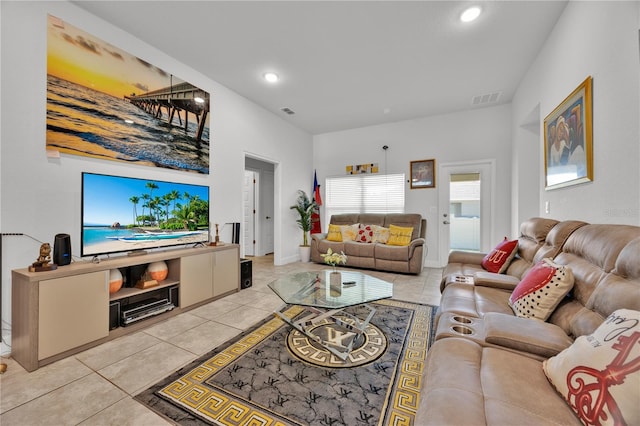 living room featuring recessed lighting, visible vents, baseboards, and light tile patterned floors