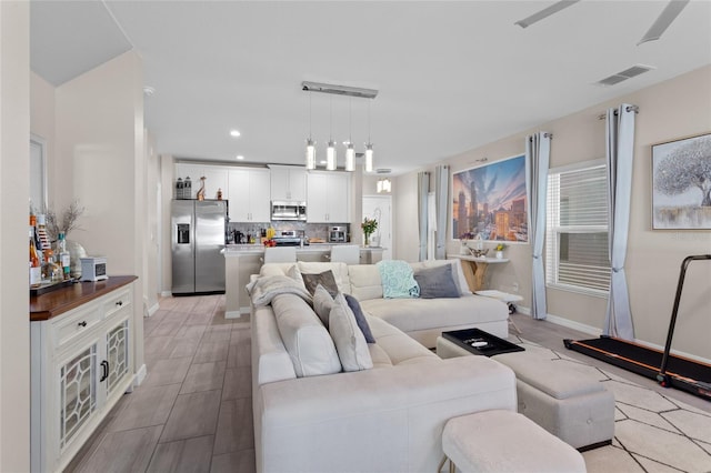 living room featuring light hardwood / wood-style floors