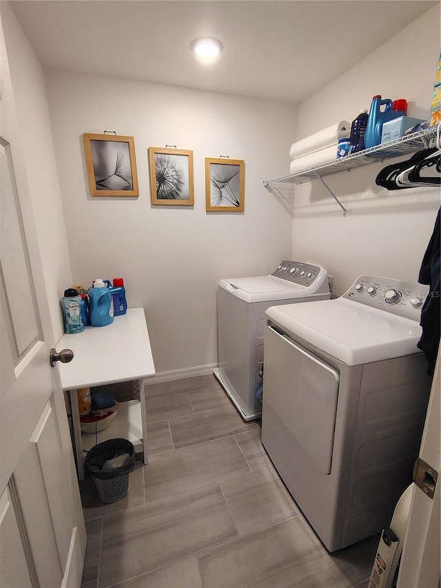 laundry room featuring washing machine and dryer