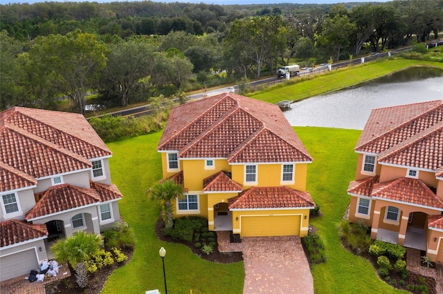 bird's eye view with a water view