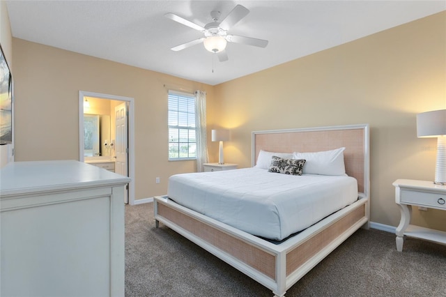 bedroom with carpet, ensuite bathroom, and ceiling fan