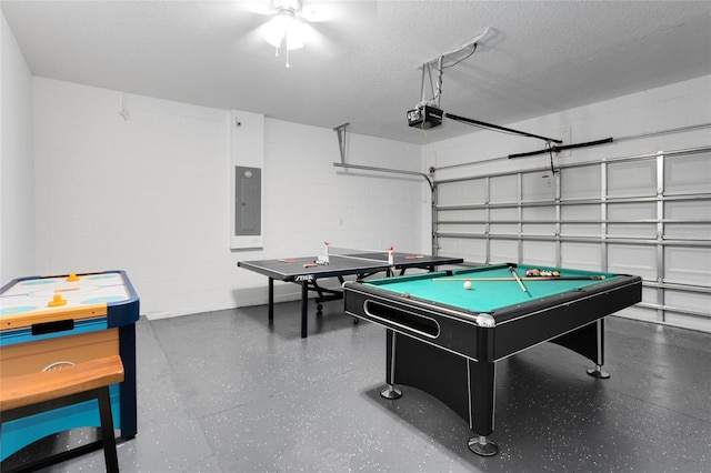 playroom with electric panel, a textured ceiling, and pool table