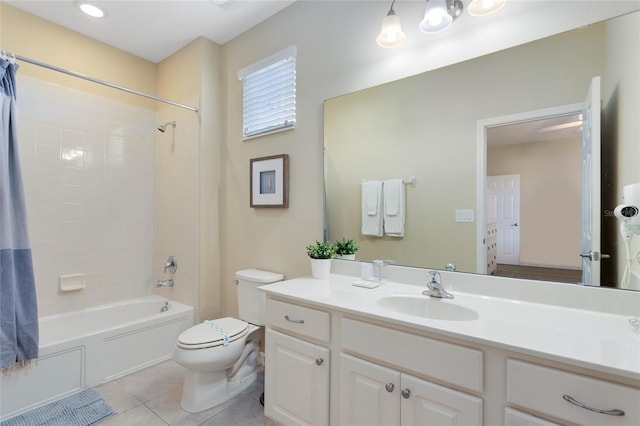 full bathroom featuring tile patterned floors, vanity, toilet, and shower / tub combo with curtain