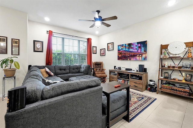 living room with ceiling fan and light tile patterned flooring