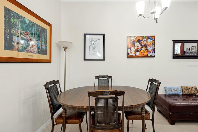 dining space featuring an inviting chandelier