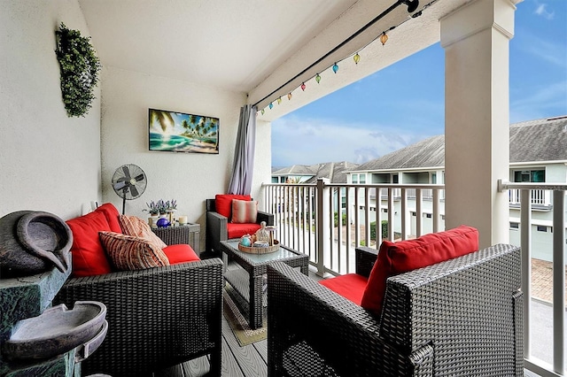 balcony with an outdoor hangout area