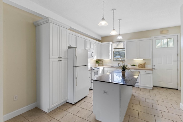 kitchen with white cabinets, hanging light fixtures, a center island, light tile patterned floors, and white appliances