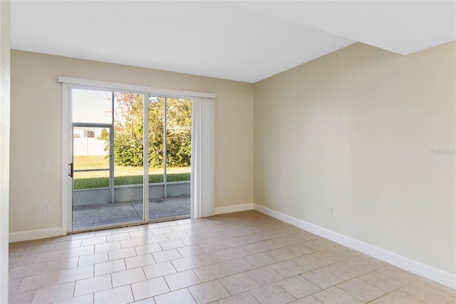 view of tiled spare room