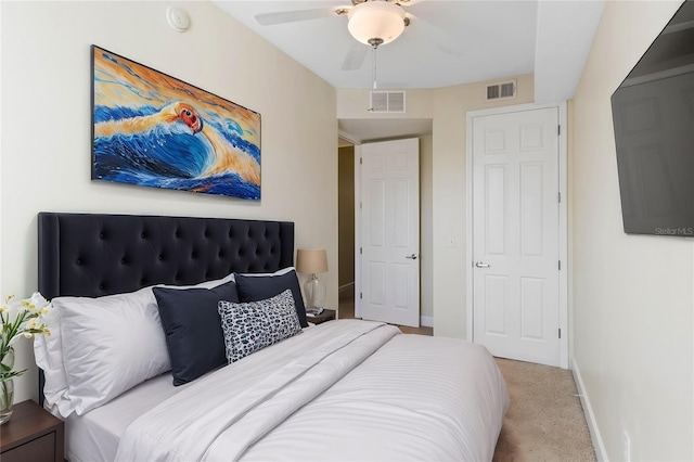 carpeted bedroom featuring ceiling fan