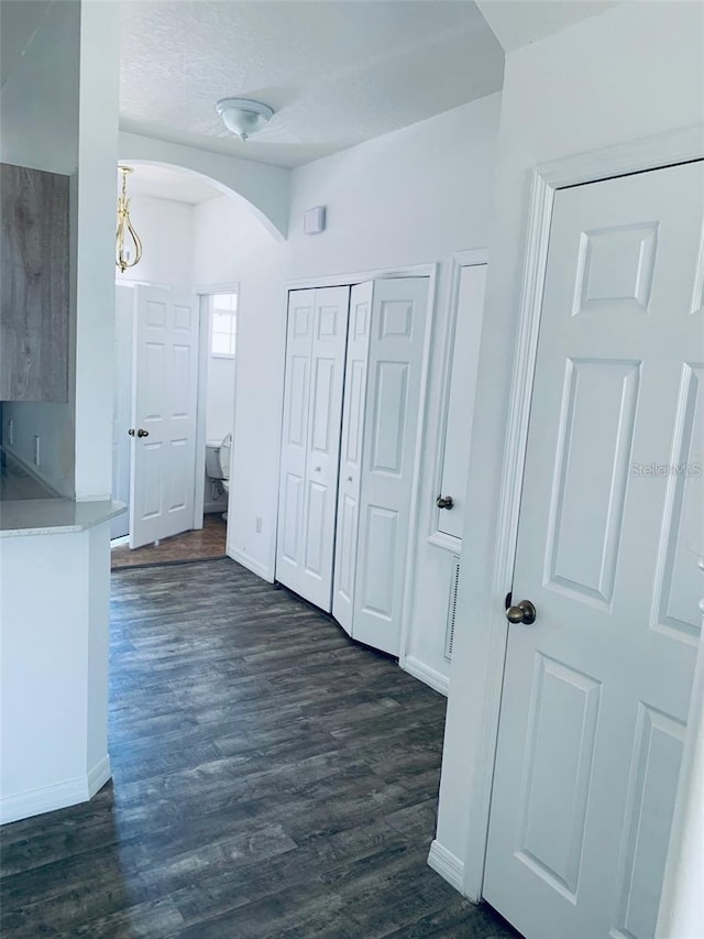 hall featuring dark hardwood / wood-style flooring