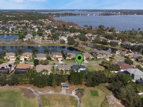 birds eye view of property featuring a water view