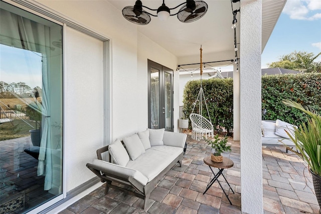 view of patio / terrace with ceiling fan