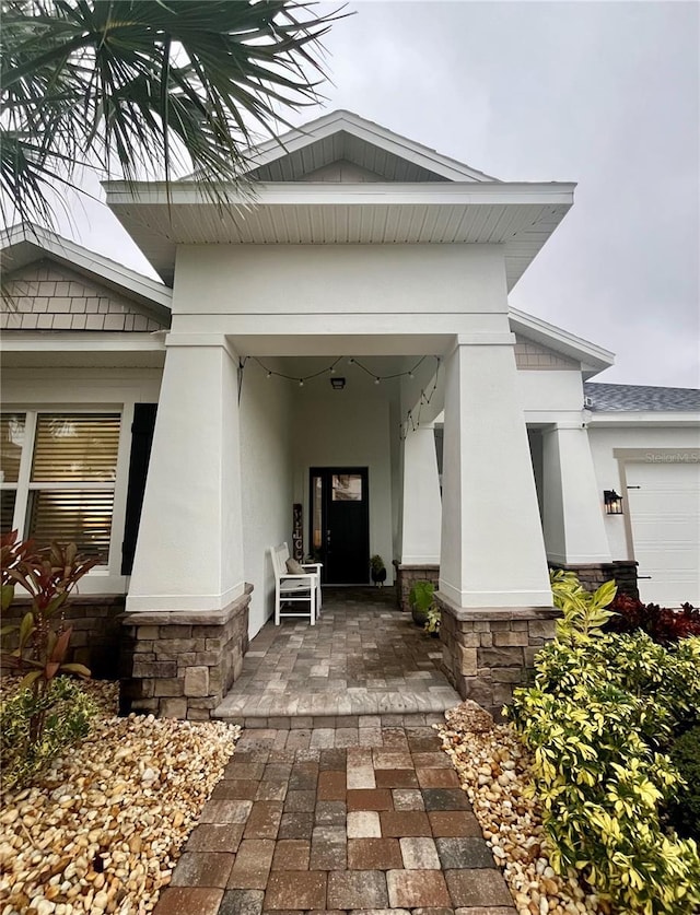 entrance to property featuring a garage