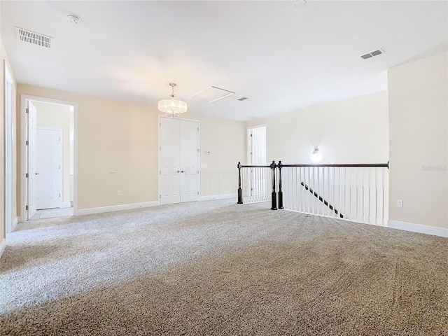 view of carpeted spare room