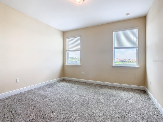 view of carpeted spare room