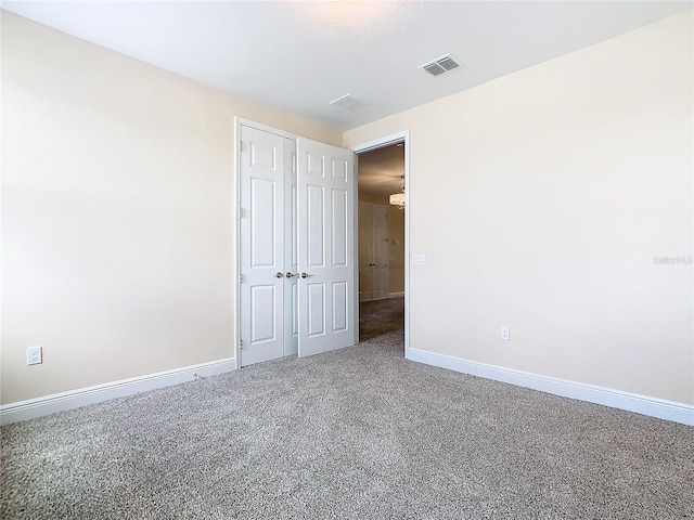 view of carpeted spare room