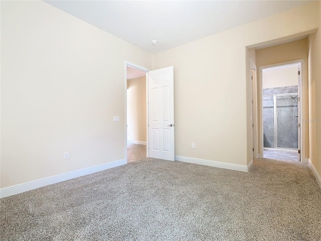 unfurnished bedroom featuring carpet floors