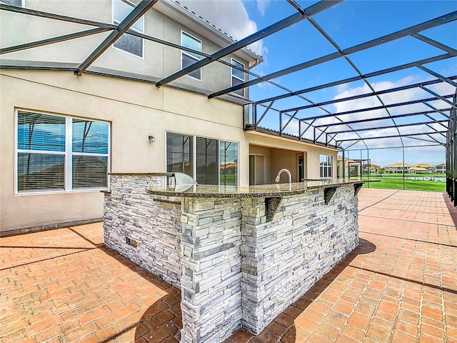 view of patio / terrace with a wet bar