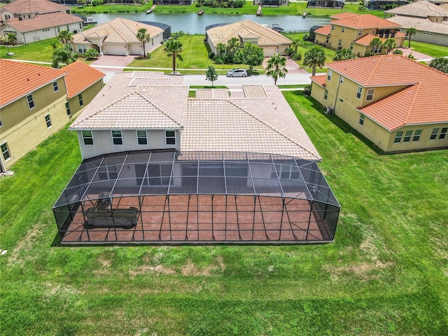 bird's eye view with a water view