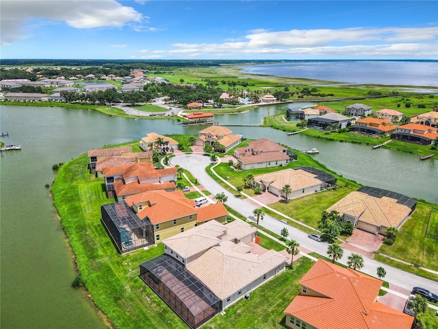 drone / aerial view with a water view