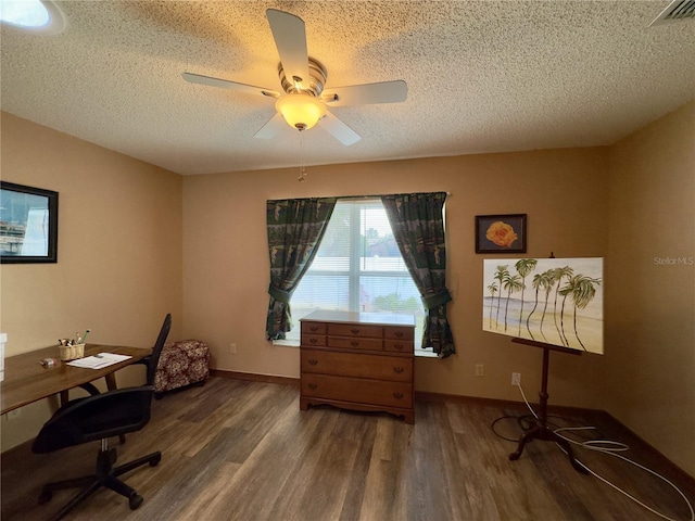 home office featuring hardwood / wood-style flooring, a textured ceiling, and ceiling fan